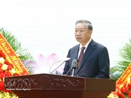 Top leader sends congratulations on police staff force’s 80th anniversary